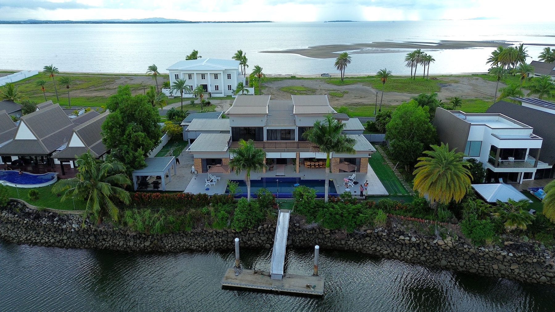 Aerial view of Villa 61, Naisoso Island, set between the lake and the sea