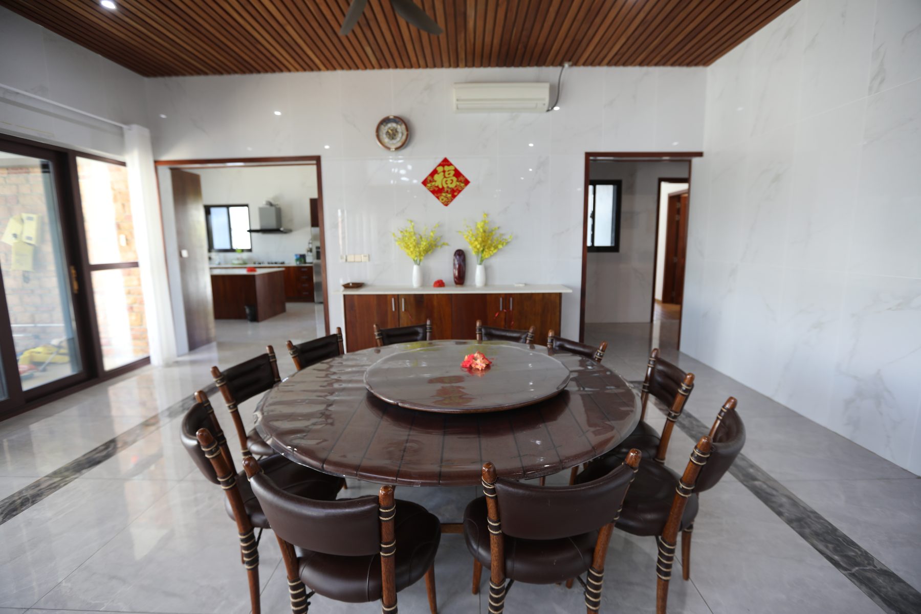 The round dining table set for the group
