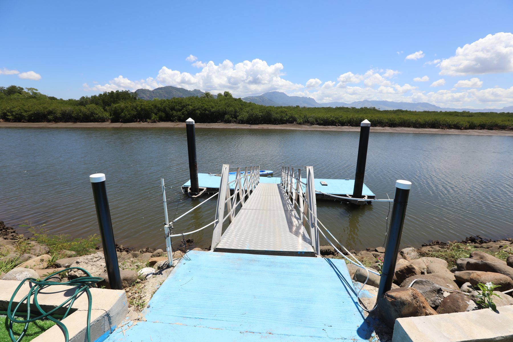 The villa's private dock stretching into the lake