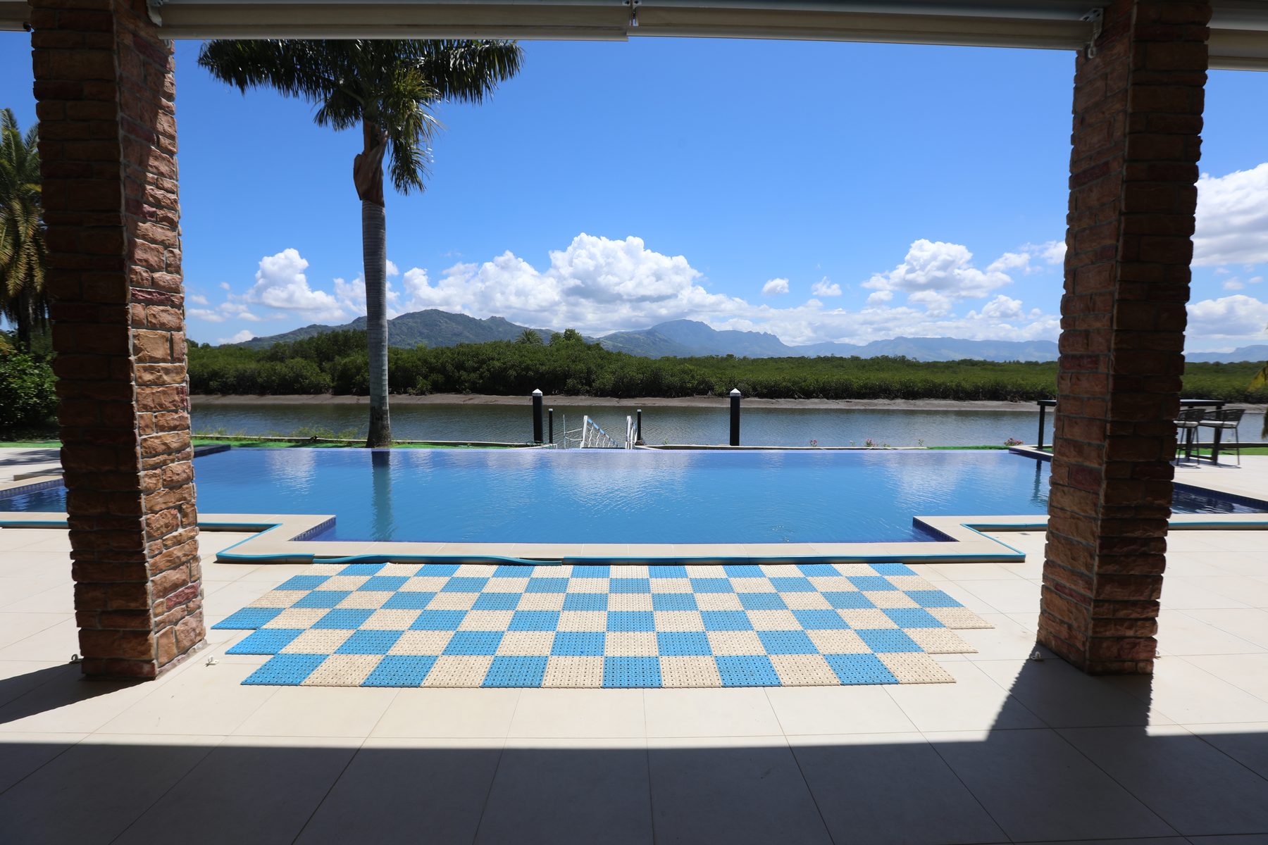 The pool running the length of the terrace