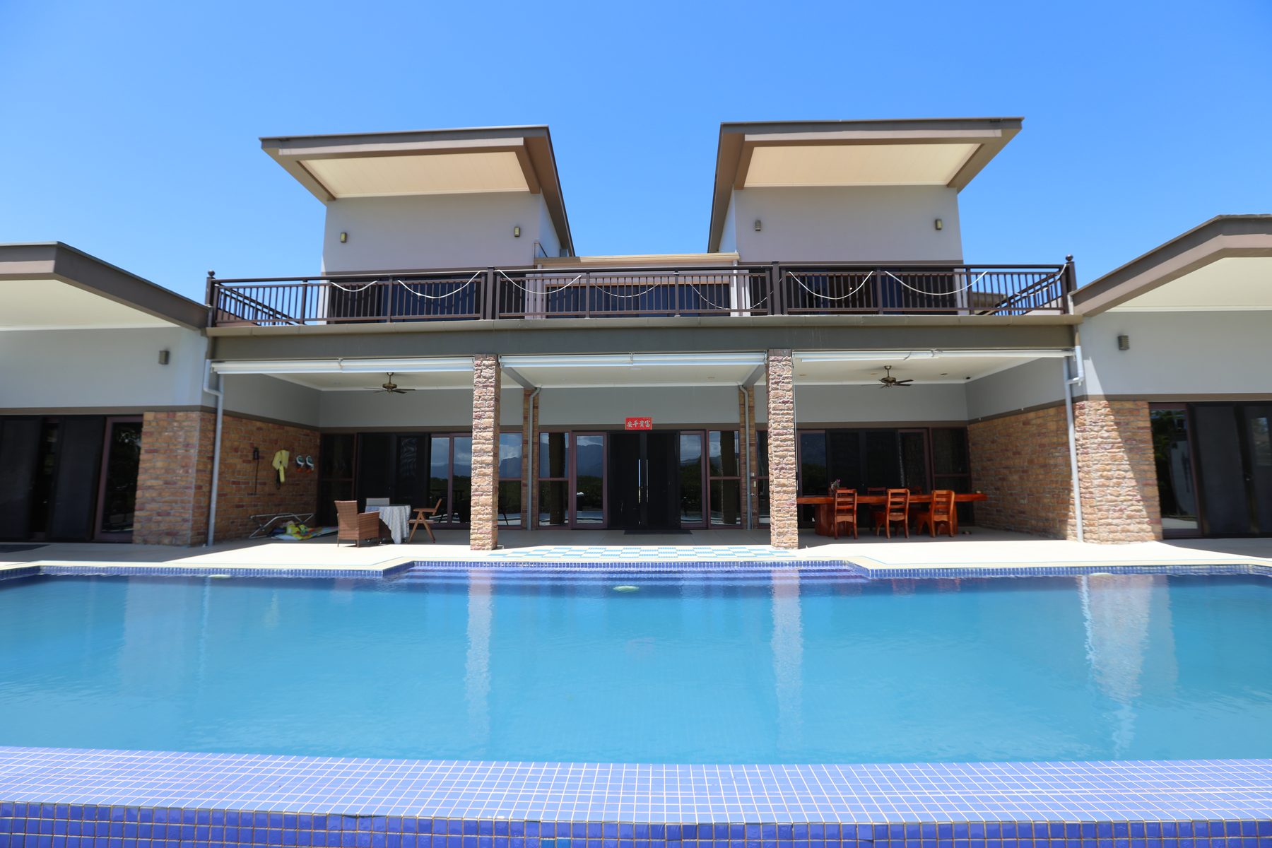 The pool and terrace at Villa 61