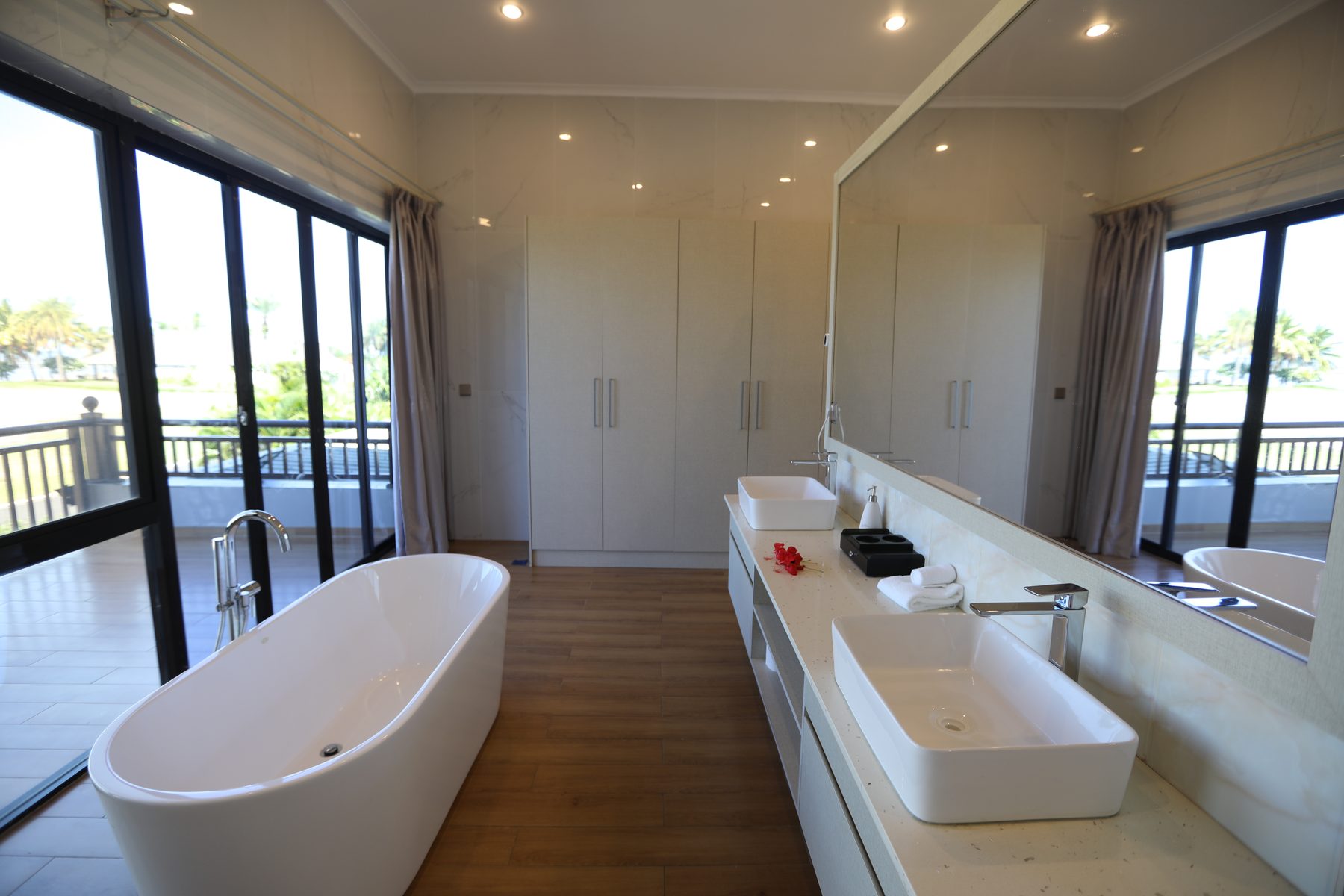 Ensuite with freestanding soaking tub and sea view