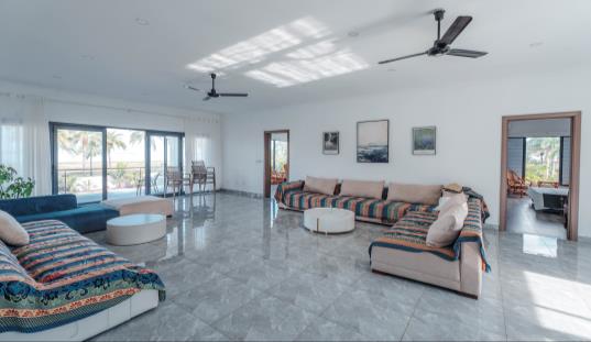 Upstairs living room opening onto the balcony